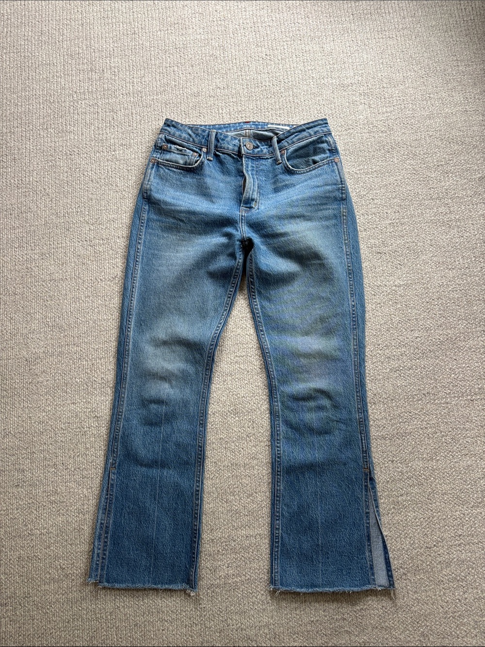 Women's High-Rise Blue Flared Jeans with Split Ankle and Raw Hem
